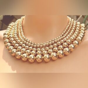 Elegant Gold and Silver Beaded Necklace
